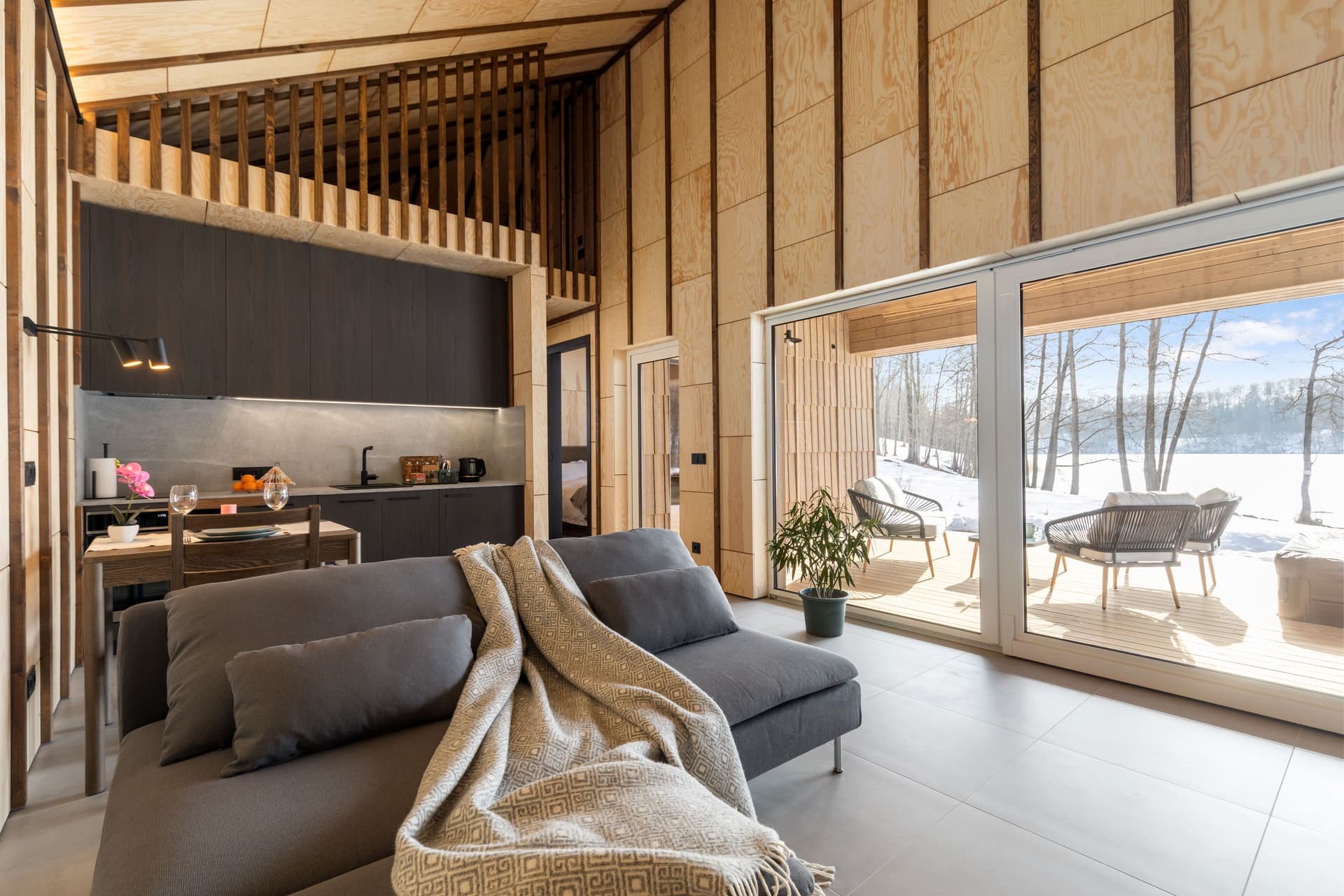 Living room with view to terrace and lake