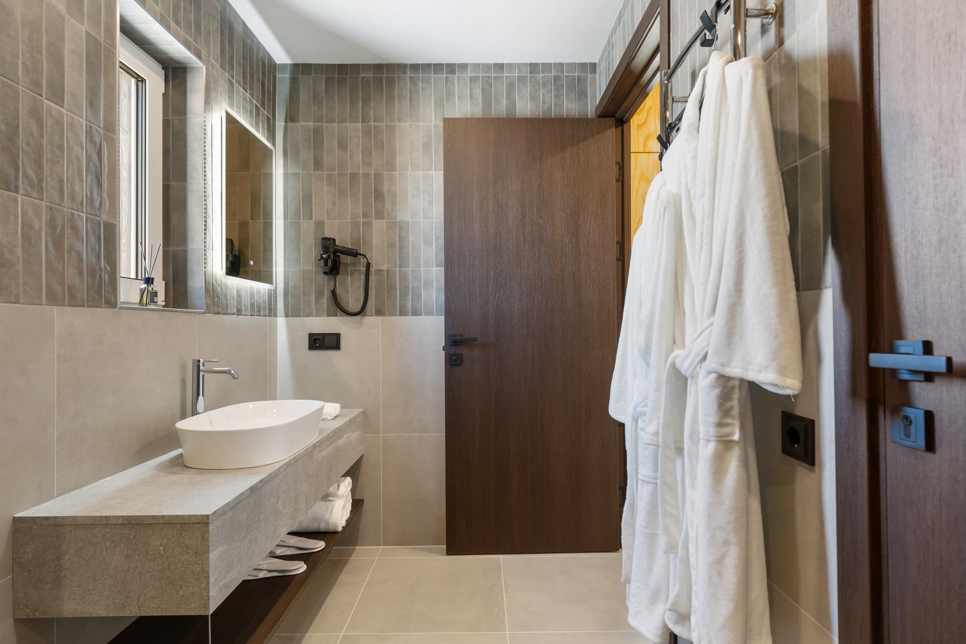Bathroom with bathrobes