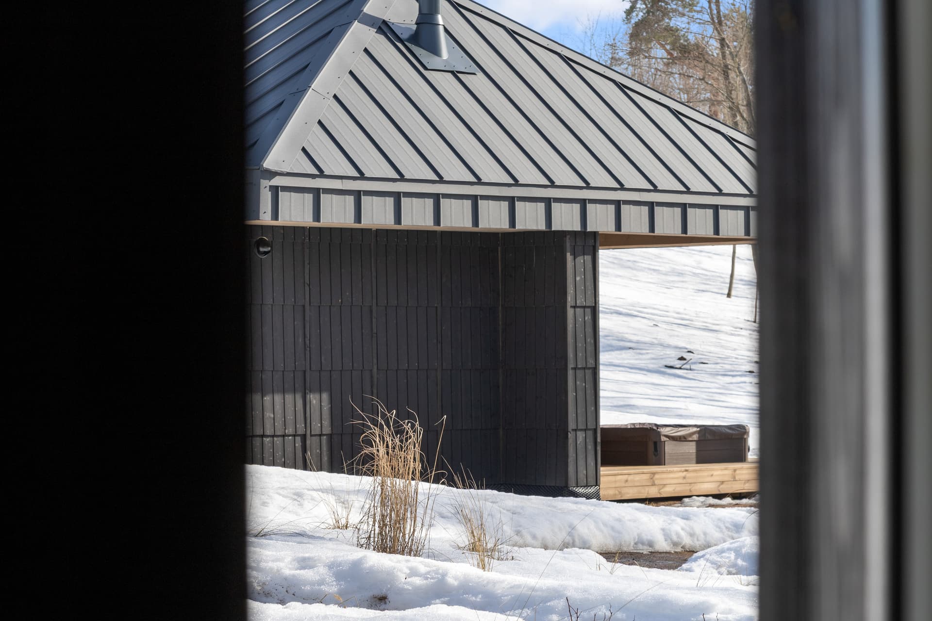 Sauna building from across the snow
